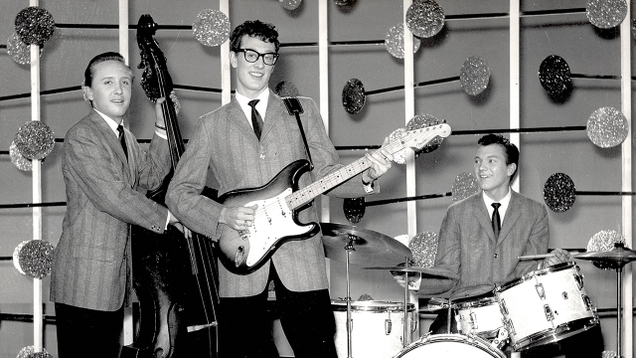 Illustration for article titled Remembering A Legend: 5 Times Buddy Holly Performed In Front Of An Audience Of 2,000 Fortune-Tellers All Screaming At Him To Never Get On An Airplane